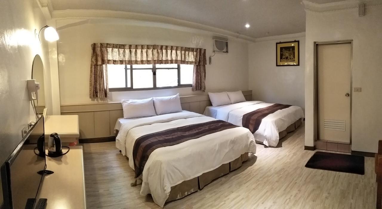 Minren Hotel يوشيه الغرفة الصورة
